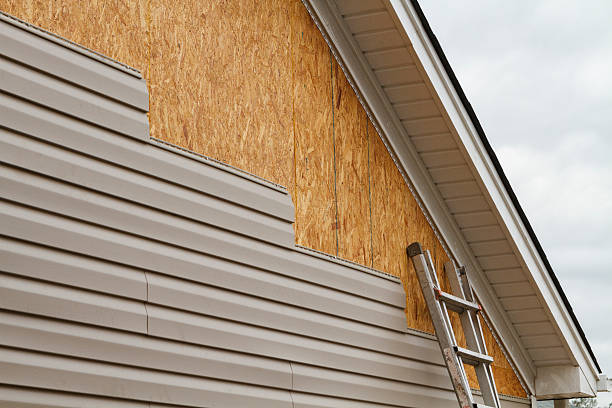 Professional Siding Installation technician working in Westville, IL
